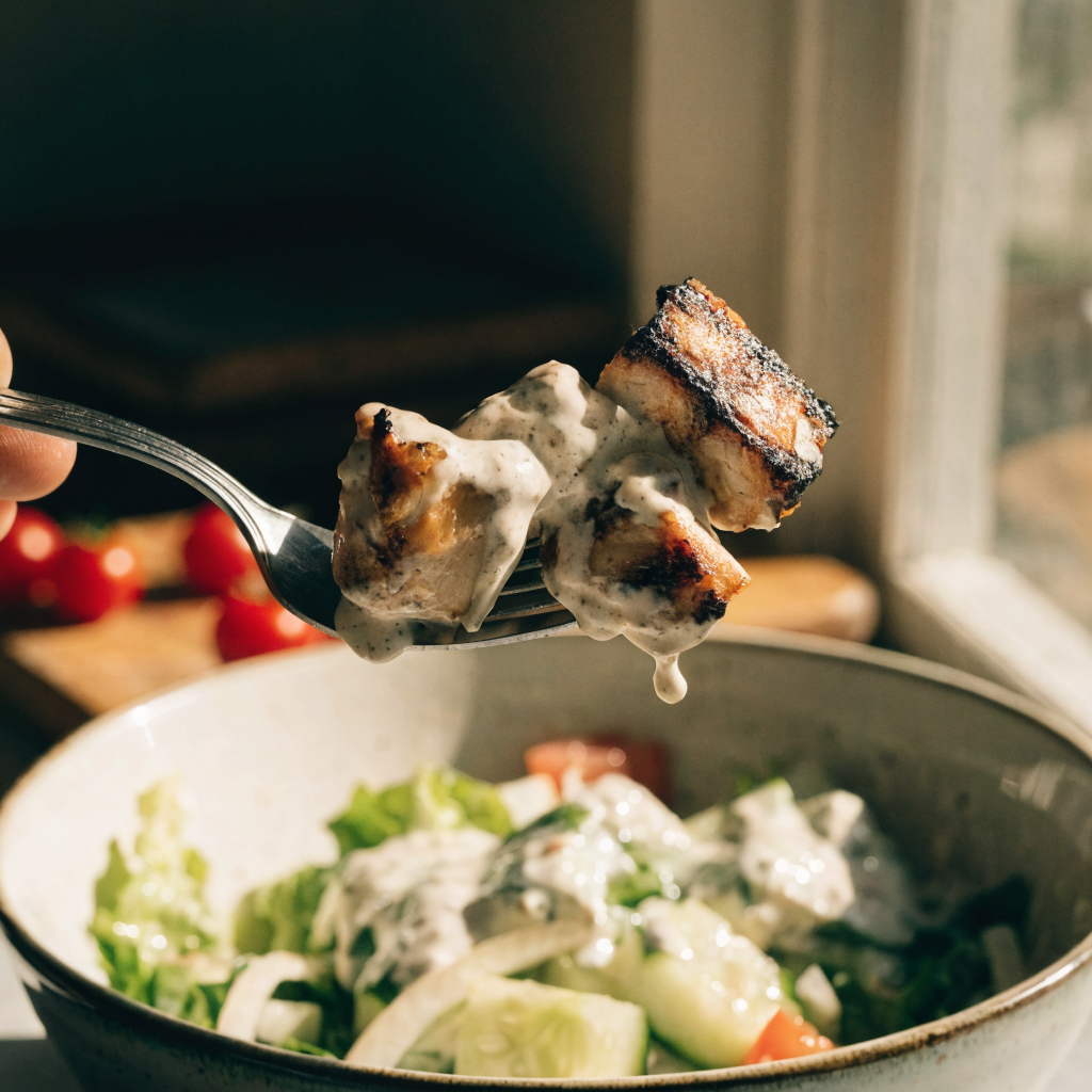 Close-up of bbq chicken skewer salad